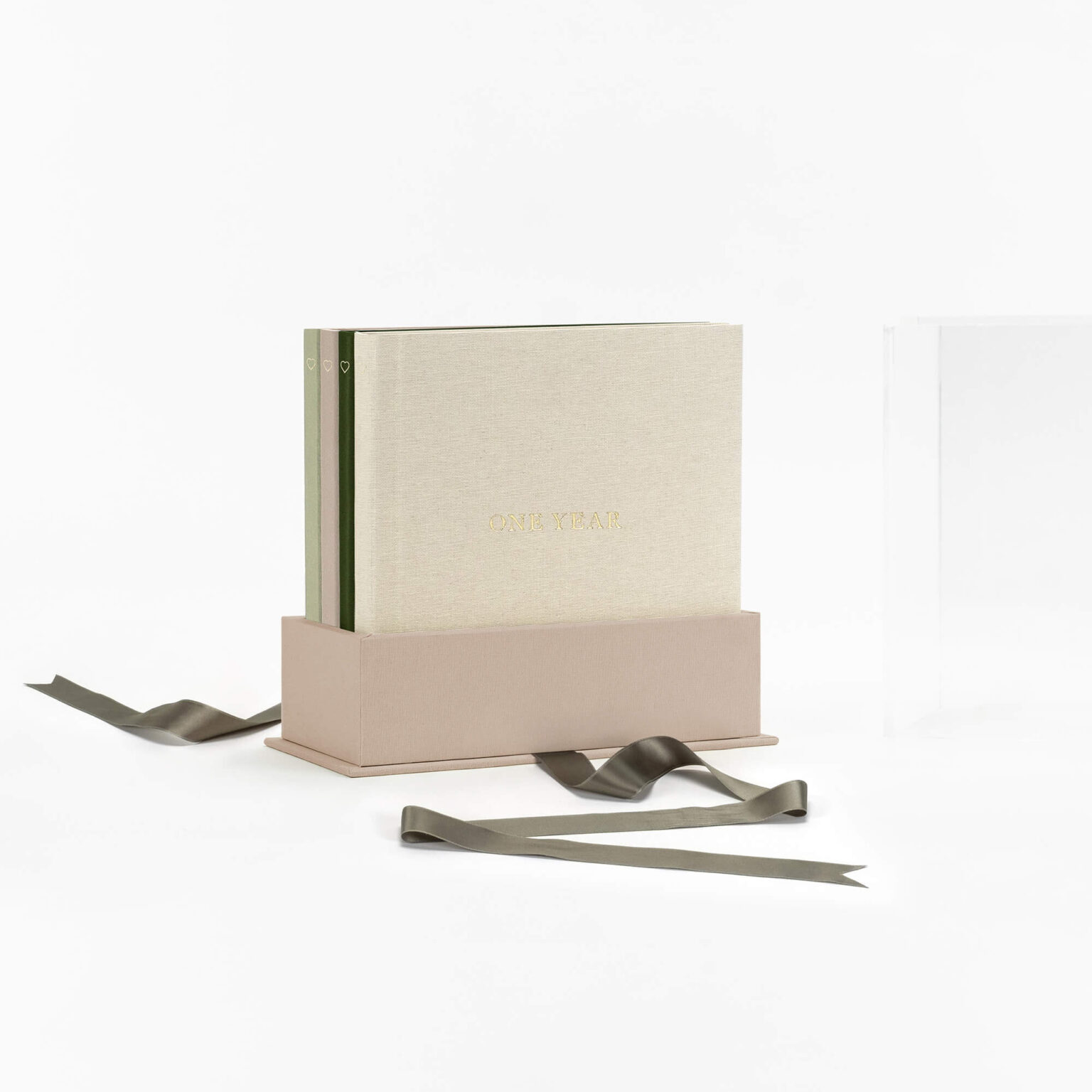 Álbum Crecer, cuatro álbumes en caja de acrílico